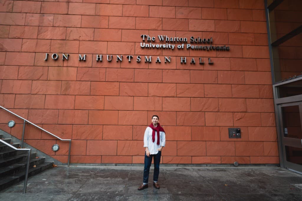 Matt outside Huntsman Hall at the Wharton School